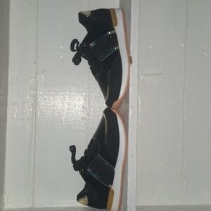 Trendy black and gold shoes